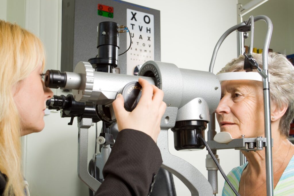 Older woman having her eyes tested for macular degeneration