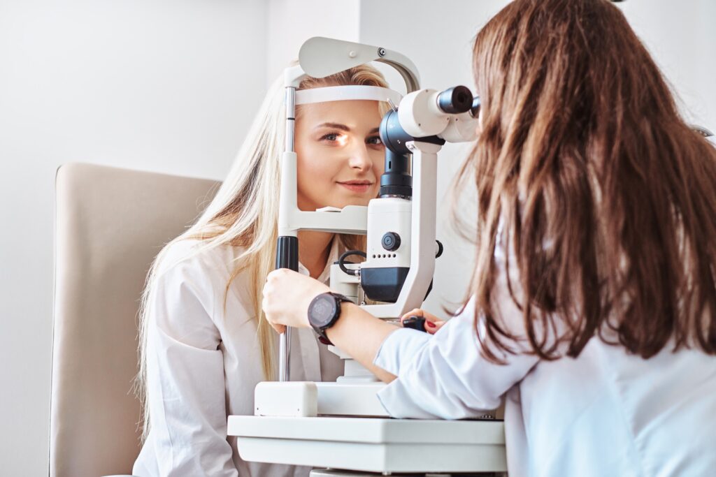 Woman getting checked by optometrist for high eye pressure
