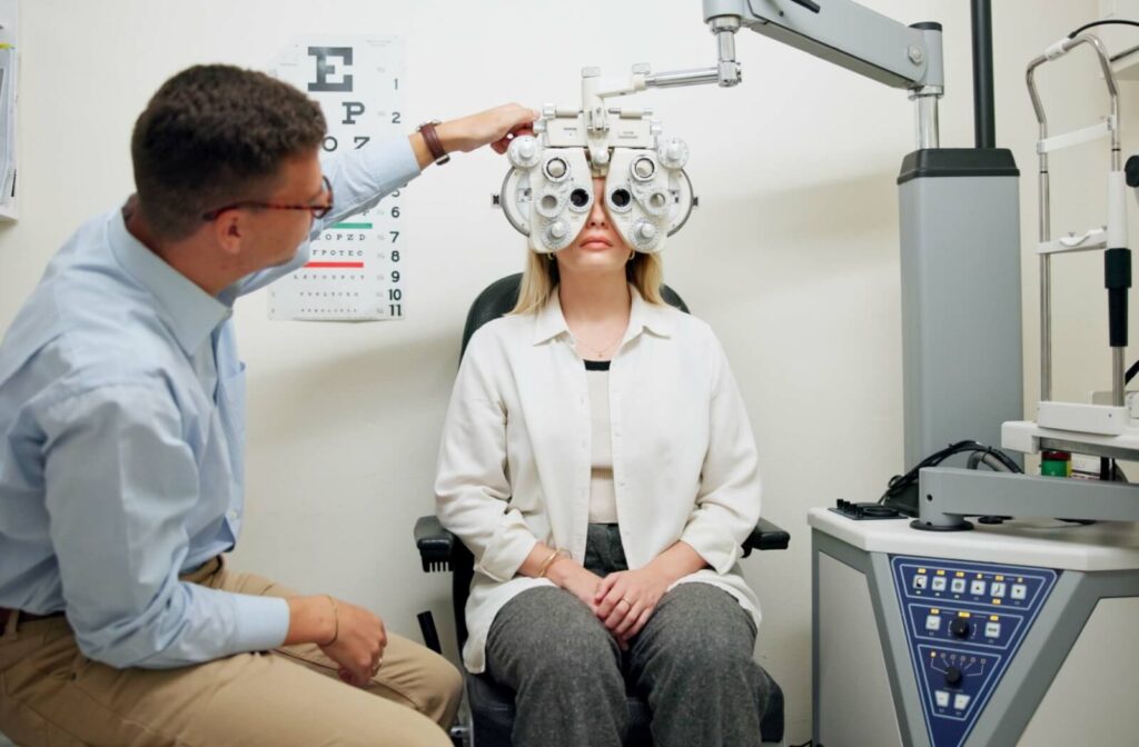An optometrist examining a patient's eyes.